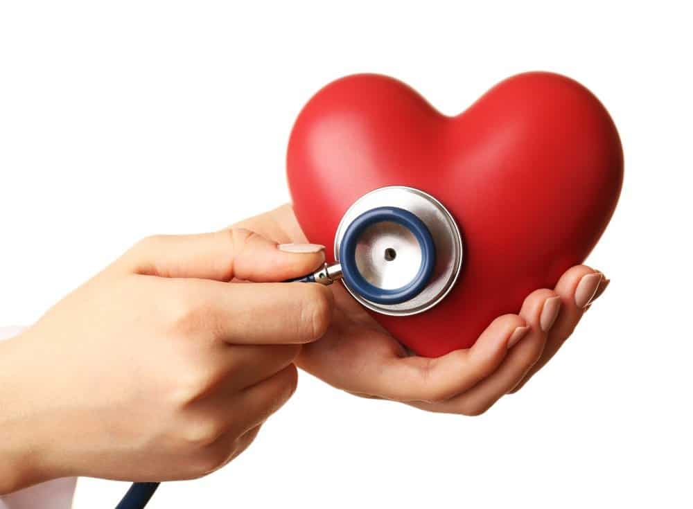 Doctor hands with heart and stethoscope - Signs You're Overdoing Cardio