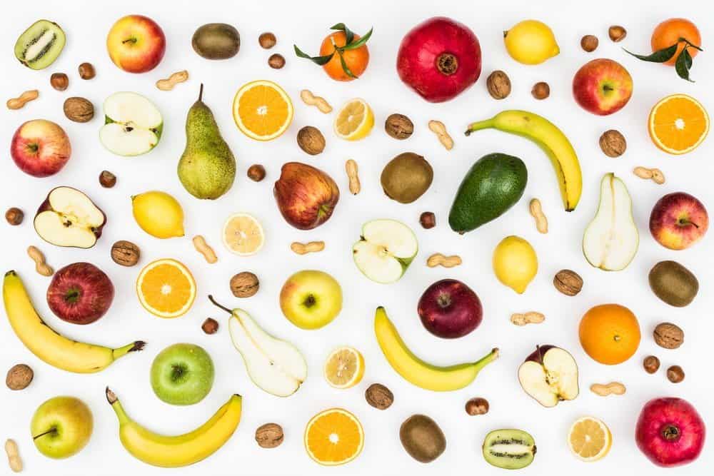 Tasty colorful fruit on white background, seamless food background - Top 10 Ways to Weight Loss
