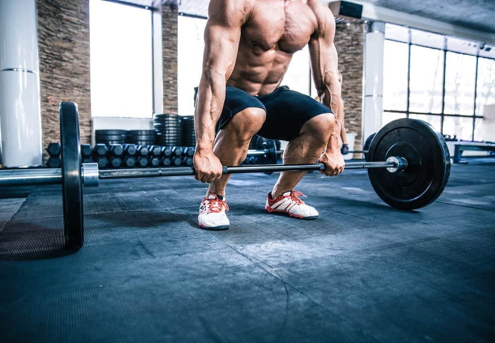 Closeup portrait of a muscular man workout - Best Strength Training Workout