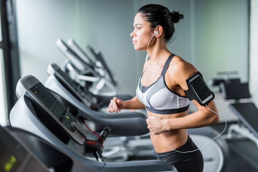 woman running on treadmill