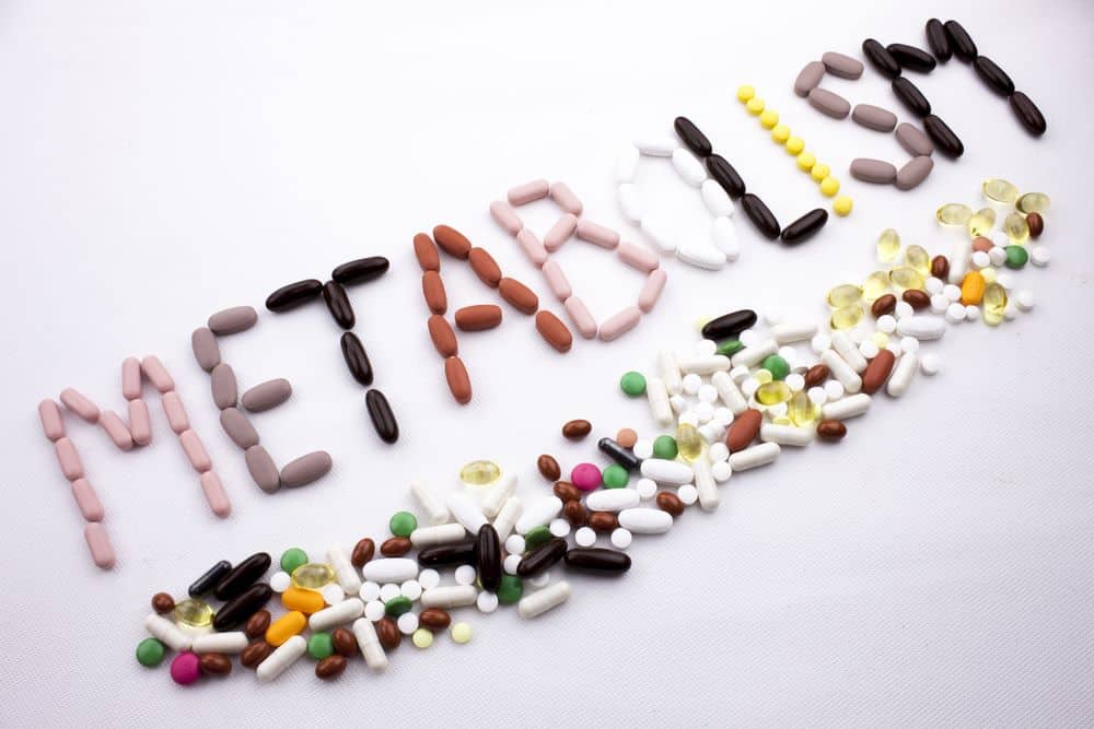 Health concept written with pills Metabolism