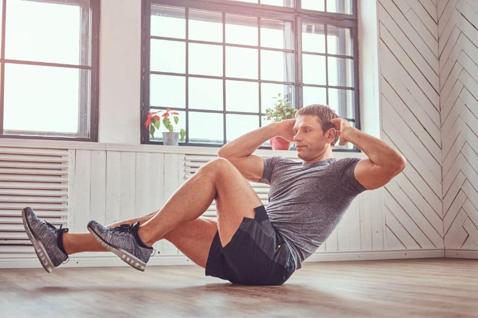 Doing sit up while training at home