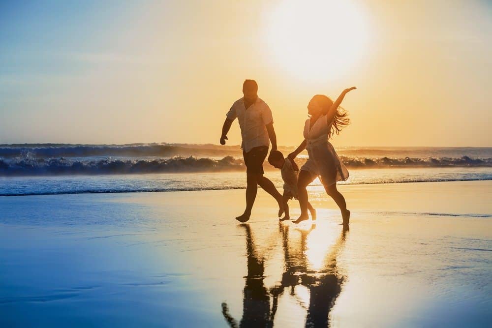 family enjoying at sea