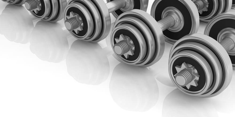 Dumbbells on white background. 3d illustration - Amazing Facts About Fitness Dumbbells weights on white background. 3d illustration