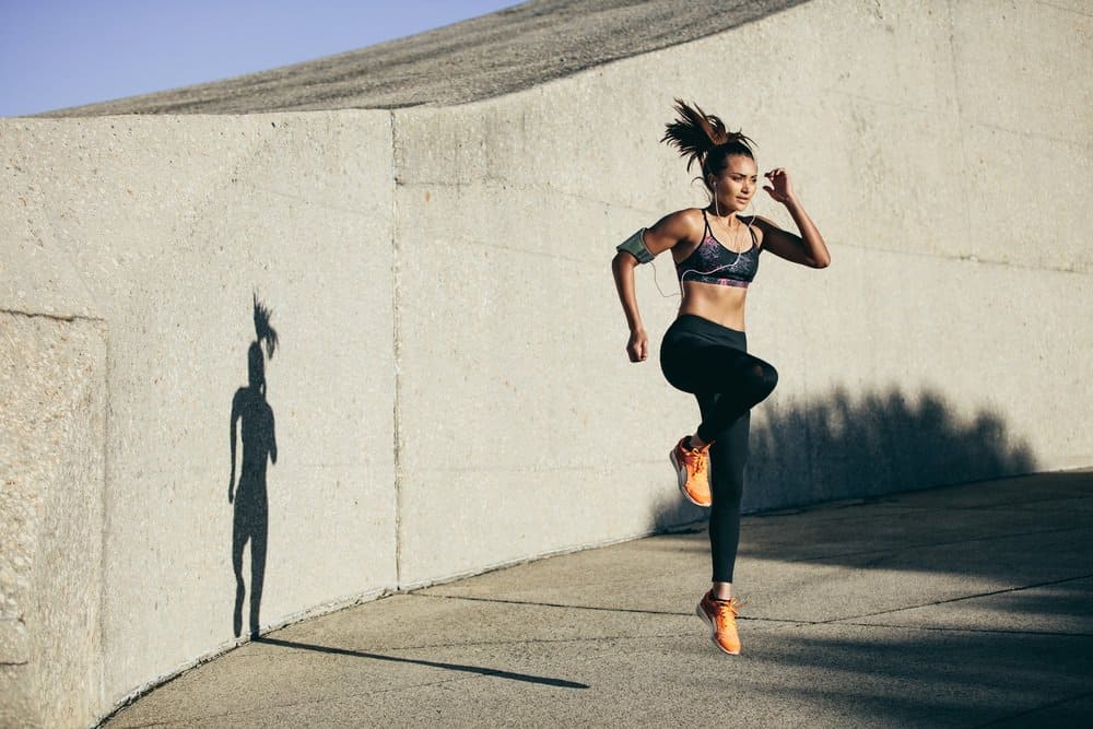 Young Fitness woman doing cardio interval training - Top Effective Tips on How to Improve Your Body’s Running Skills and Avoid the Risk of Injuries – The Definite Guide