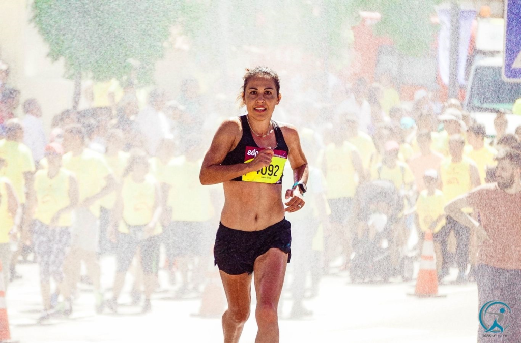 A woman finishing a marathon race