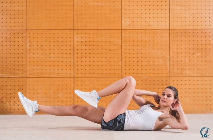 Bicycle Crunches is a great exercise for a HIIT Ab Workout