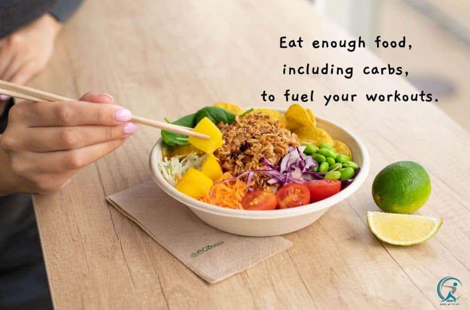 You should eat enough food, including carbs, to fuel your workouts