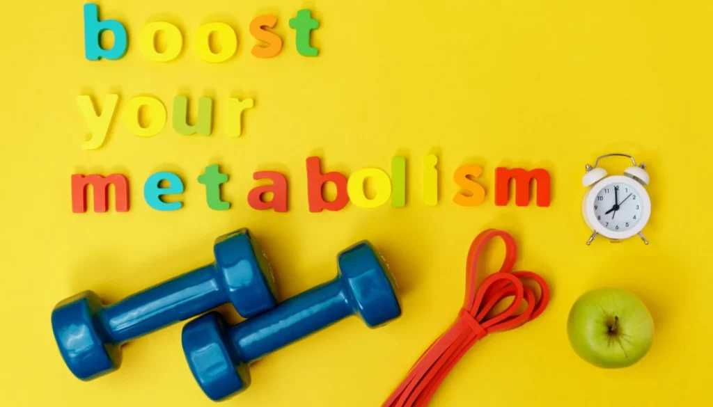 The letters "boost your metabolism" are arranged next to a pair of dumbbells, a resistance band, and an apple.