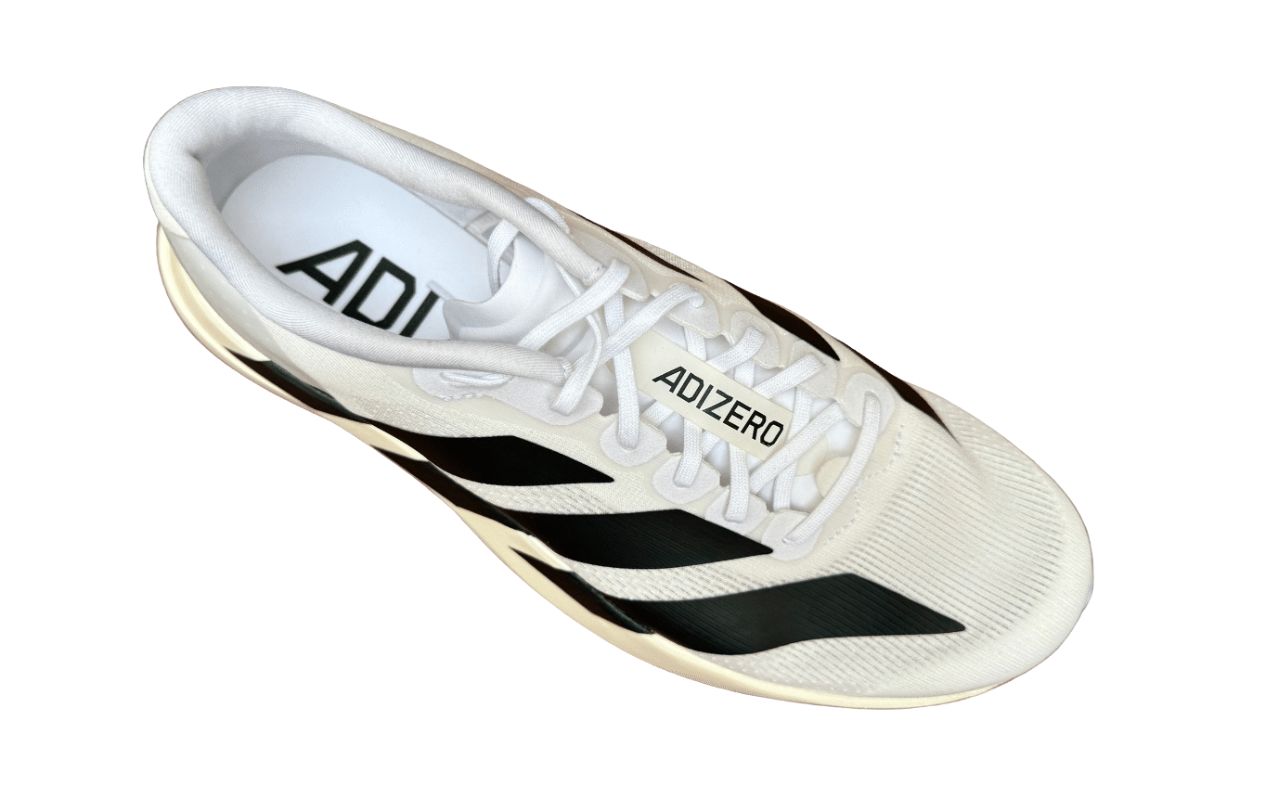 The image shows a white Adidas Adizero Evo SLE running shoe with black accents, positioned at an angle to showcase its...