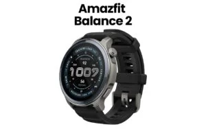 The image features Amazfit Balance 2 with a black band and a round, silver-rimmed face. The watch face displays various...