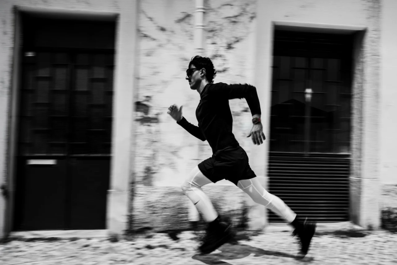 Runner wearing the Apple Watch Ultra 4 during an urban run