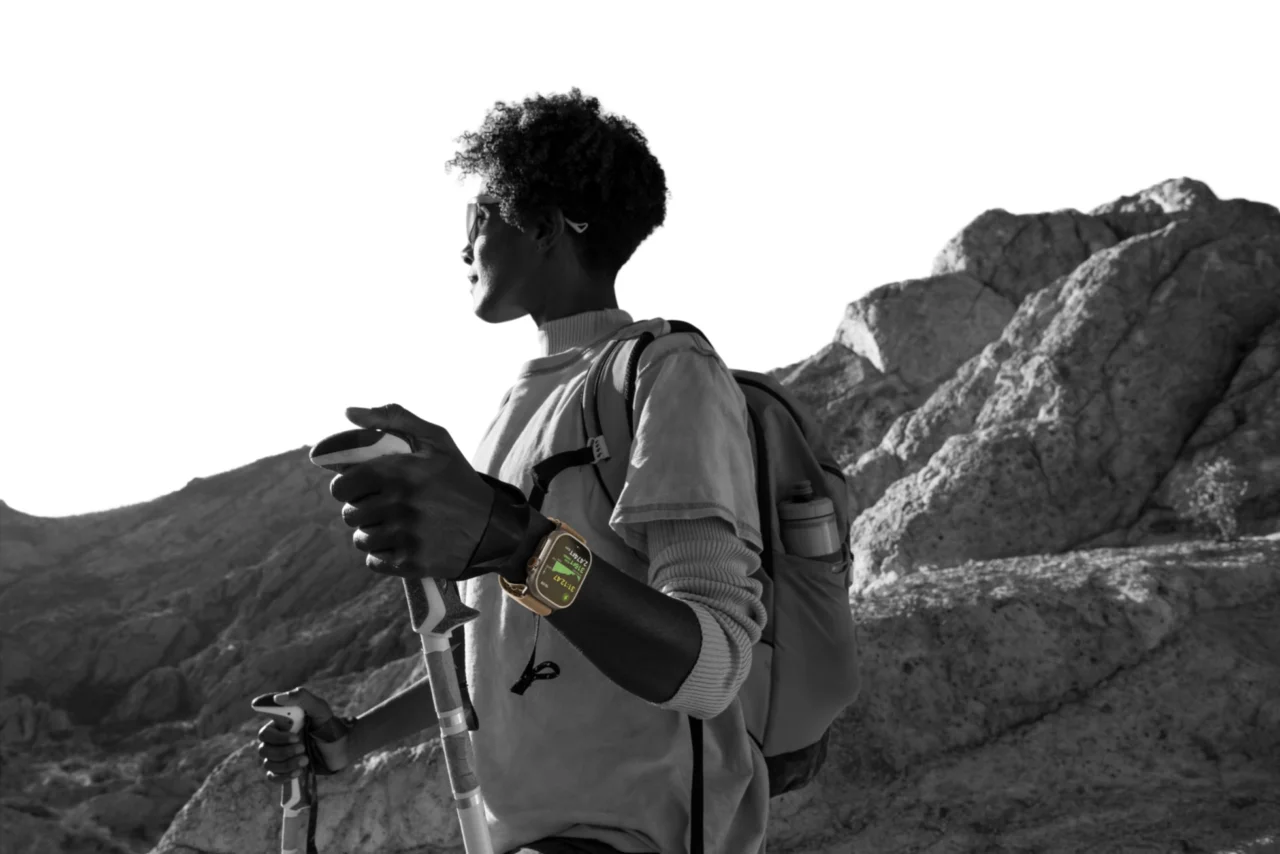 Adventurer wearing the Apple Watch Ultra 4 in the outdoors